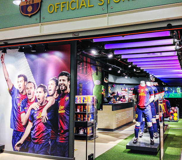 Barcelona Football Club Official Fan Store, Spain "Barcelona, Spain - October 13, 2012: Barcelona Football Club Official Fan Store in Barcelona Airport, Spain" barça stock pictures, royalty-free photos & images