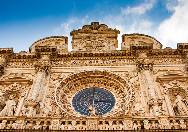 Baroque Facade of Basilica di Santa Croce in Lecce, Italy The ornate baroque facade of the Basilica di Santa Croce in Lecce, Italy. Shot at the golden hour. lecce stock pictures, royalty-free photos & images