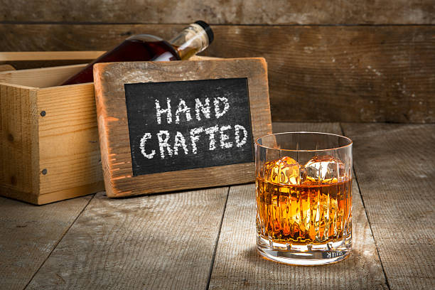 Barrel aged craft liquor bourbon whisky scotch brandy wood bar stock photo