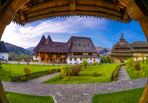 Landscape with the area of  Birsana Monastery in Maramures, Romania, which has places of worship with elongated towers and traditional wooden architecture