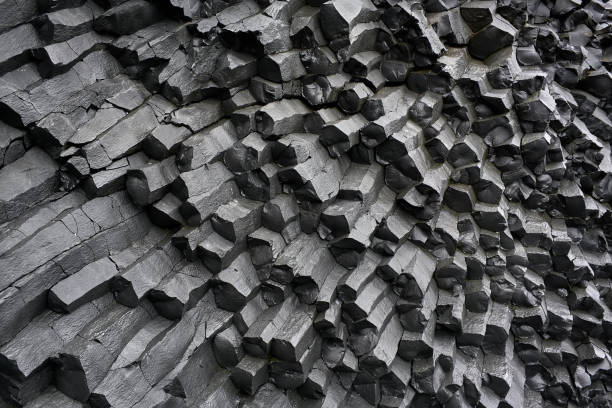 Basalt column formation Black basalt column formation in Iceland. Closeup. Horizontal. basalt stock pictures, royalty-free photos & images