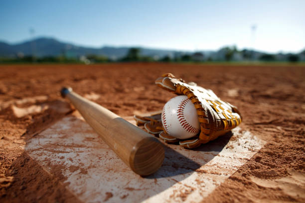 Baseball game Baseball and glove Bat at Home Plate sports bat stock pictures, royalty-free photos & images