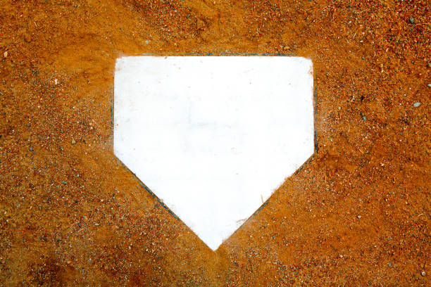 Baseball/Softball Home Plate Background home plate background on clay dirt base sports equipment stock pictures, royalty-free photos & images