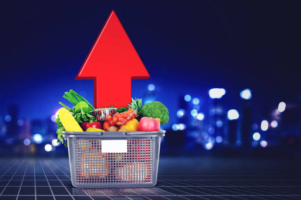 Basket full of groceries with upward arrow stock photo