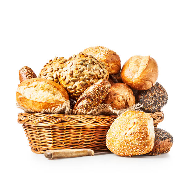 Basket of bread buns Basket of various bread rolls and buns isolated on white background clipping path included bun bread stock pictures, royalty-free photos & images