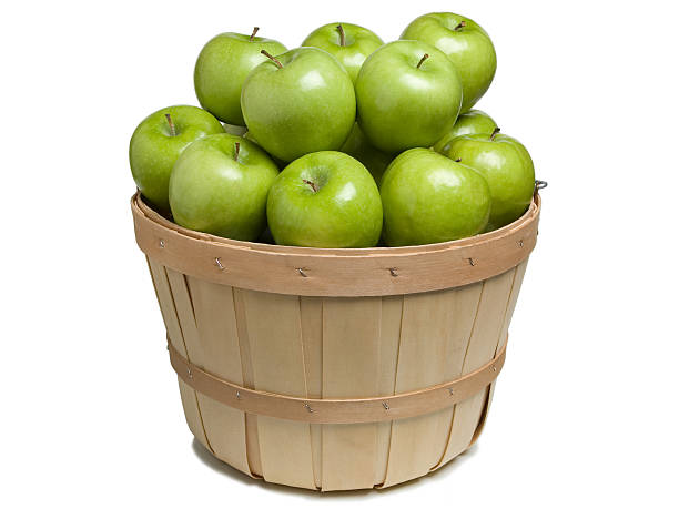 Basket with Green Apples stock photo