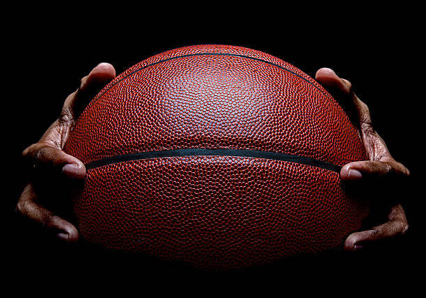 Basketball and Hand Gripping stock photo