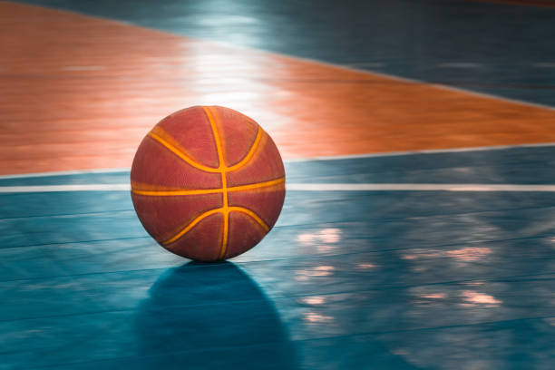 Basketball ball on the court stock photo