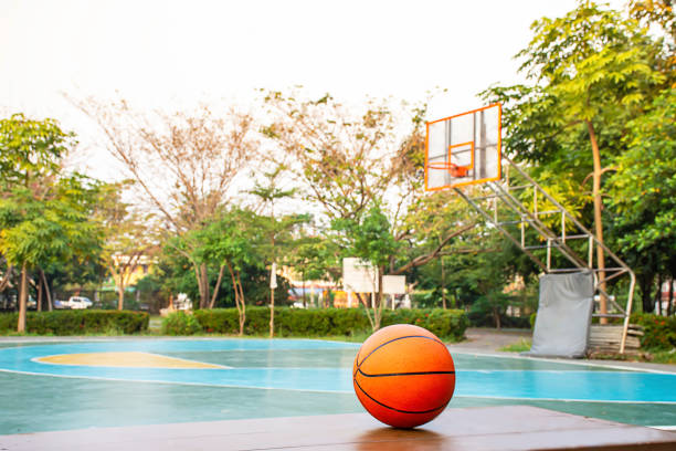 Basketball on the wooden chair Background basketball court and park. stock photo