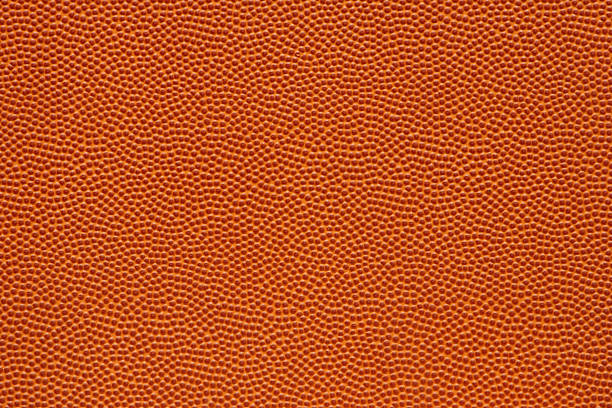 Basketball Texture The perfect texture of a basketball, with thousands of little orange bumps. No seams, lines, or anything. A great background. My 10th flame on February 2, 2007. Thanks! bumpy stock pictures, royalty-free photos & images