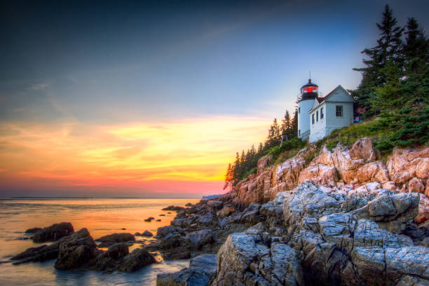 Bass Harbor Lighthouse A beautiful sunset @ Bass Harbor, Acadia National Park, Maine, USA maine stock pictures, royalty-free photos & images