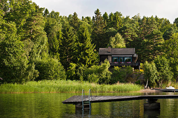 bathing jetty and little hut at the swedish archipelago - badstrand sommar sverige bildbanksfoton och bilder