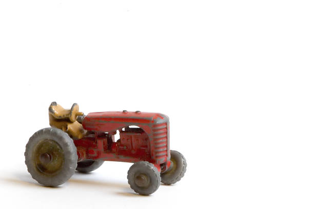 battered tractor stock photo
