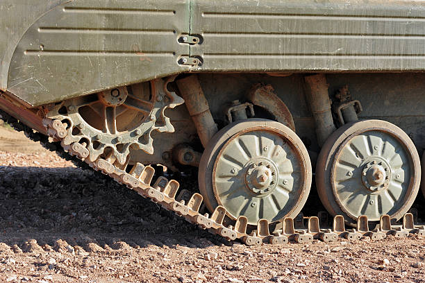 battle tank wheels and chain stock photo