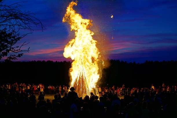Bavaria, Customs and tradition. Johannisfeuer or Sonnwendfeuer where  Straw dolls are burned at Saint John's Eve. stock photo
