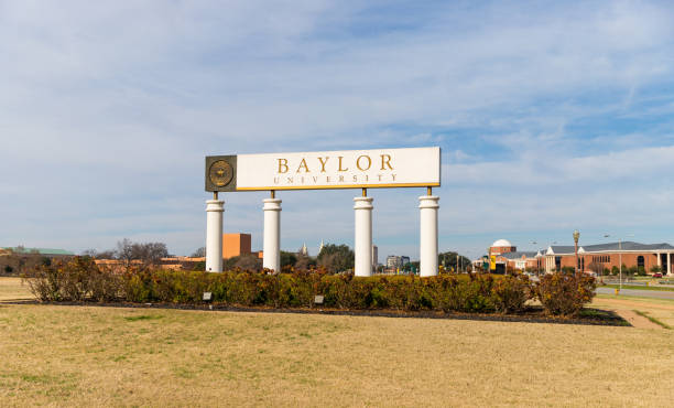 Baylor University sign and logo Waco, TX / USA - January 12, 2020: Baylor University Sign at the Entrance to Baylor University in Waco, Texas. baylor basketball stock pictures, royalty-free photos & images