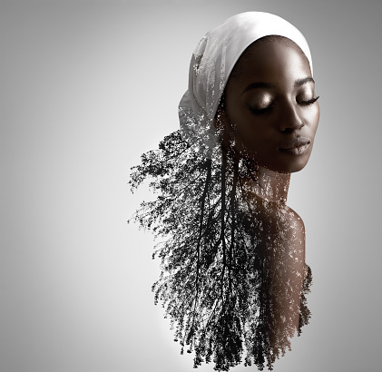Composite image of nature superimposed on a young womanhttp://195.154.178.81/DATA/i_collage/pi/shoots/783373.jpg