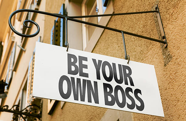 Be Your Own Boss sign in a conceptual image stock photo