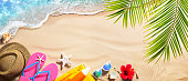istock Beach Accessories On Tropical Sand And Seashore - Summer Vacations 1322518125