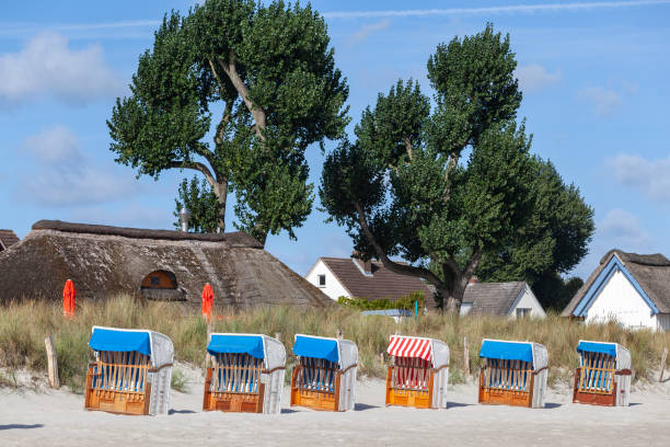 Beach chairs and holiday homes in Haffkrug, Germany stock photo