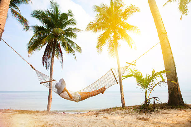 Beach Hammock Beautiful girl in a Beach Hammock beach holiday stock pictures, royalty-free photos & images