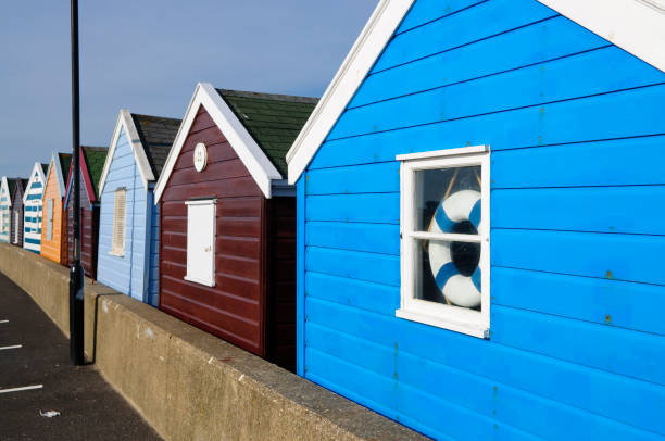 Beach huts UK stock photo