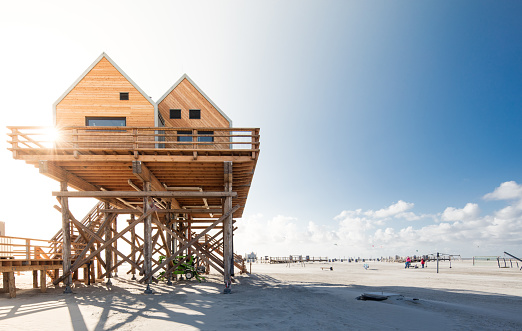 Beach of St. Peter-Ording in Germany with pile dwelling
