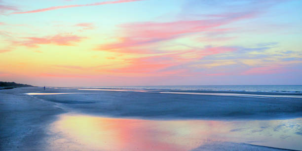 Beach Sunrise with reflection in a tide pool-Hilton Head, South Carolina stock photo