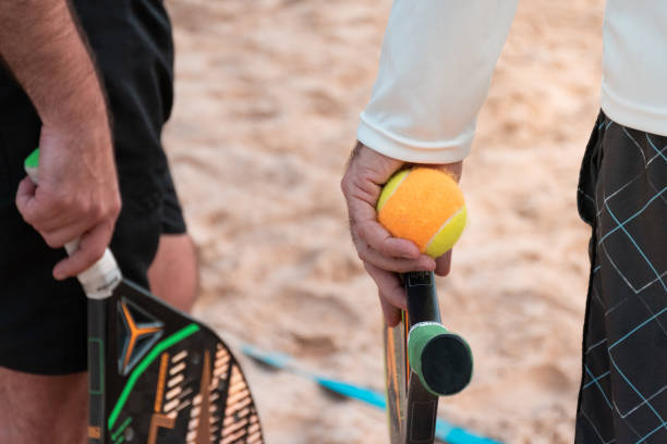 Beach tennis racket and ball stock photo