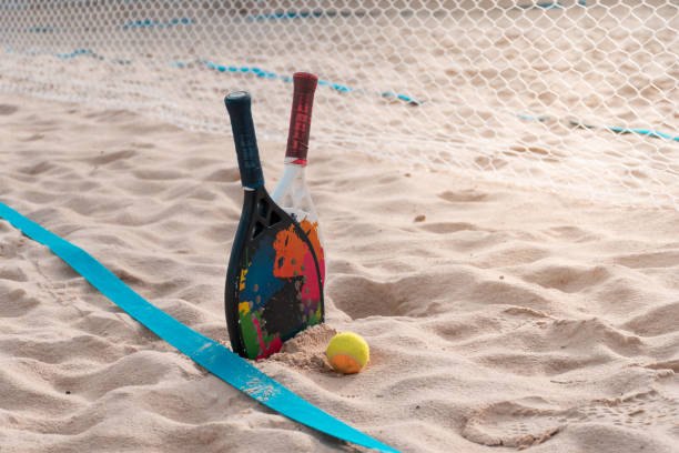 Beach tennis racket and ball stock photo