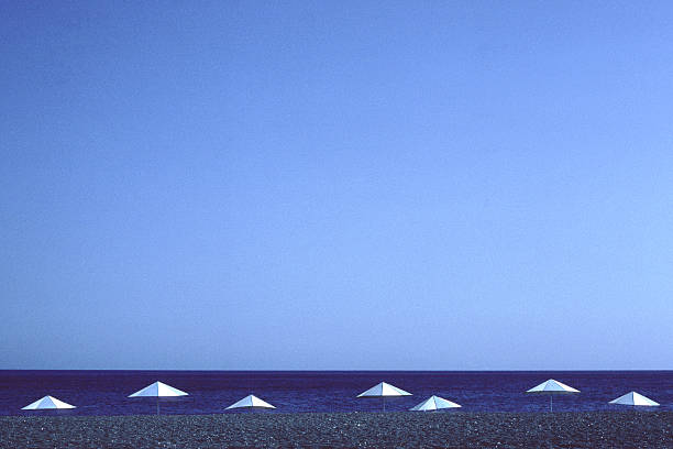 Beach Umbrellas, Perissa, Santorini, Greece stock photo