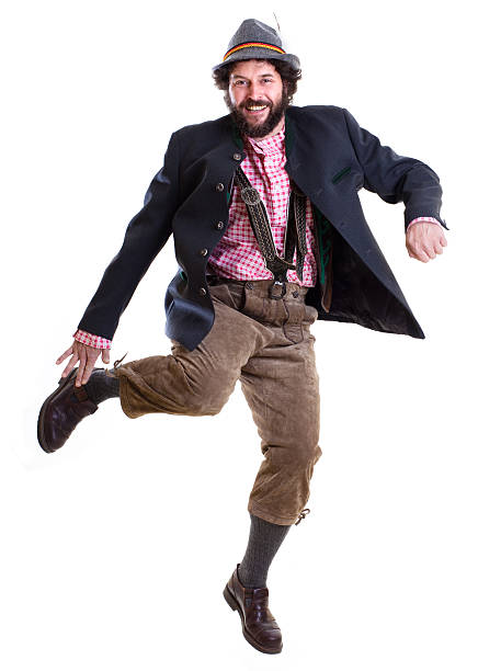 Bearded bavarian man in traditional clothing, dancing stock photo