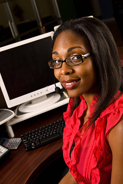 Beautiful African American receptionist stock photo