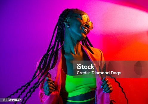 istock Beautiful afro woman with pigtails and stylish clothes 1342849839