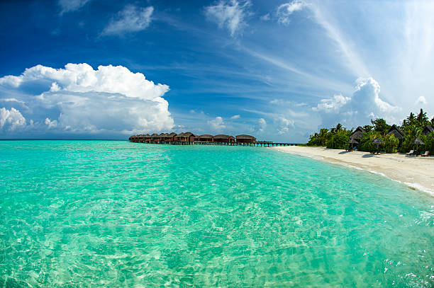 Beautiful beach with water bungalows at Maldives stock photo