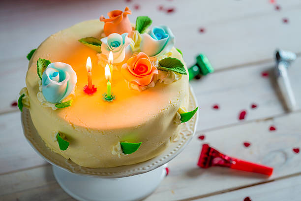 Beautiful birthday cake ready for blowing candles Beautiful birthday cake ready for blowing candles. sugar and spice moments photography stock pictures, royalty-free photos & images