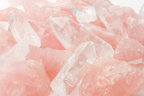 beautiful blush colored rose quartz crystals - kristal stockfoto's en -beelden