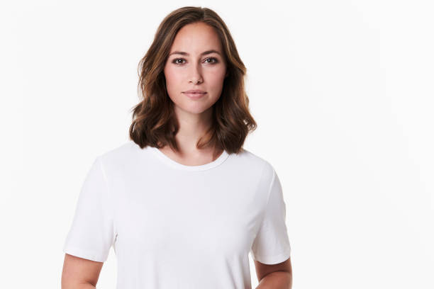 Beautiful brunette in white Beautiful brunette in white t-shirt, portrait brown eyes stock pictures, royalty-free photos & images