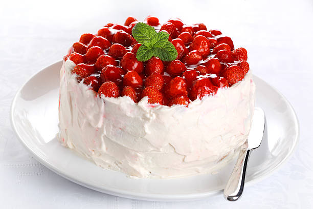 beautiful cake with strawberries and cream stock photo