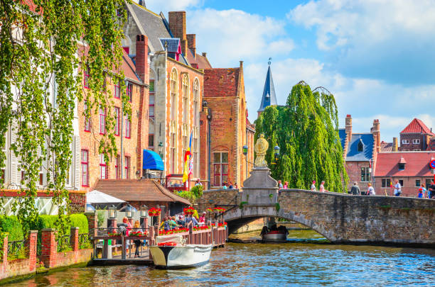 Beautiful canal and traditional houses in the old town of Bruges (Brugge), Belgium  brugge belgium stock pictures, royalty-free photos & images