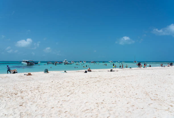 Beautiful Caribbean beach Playa Norte or North beach on the Isla Mujeres near Cancun with many yachts, Mexico stock photo