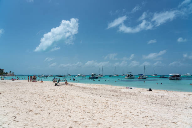 Beautiful Caribbean beach Playa Norte or North beach on the Isla Mujeres near Cancun with many yachts, Mexico stock photo