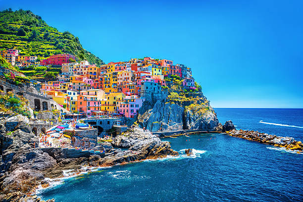 Beautiful colorful cityscape Beautiful colorful cityscape on the mountains over Mediterranean sea, Europe, Cinque Terre, traditional Italian architecture coastline stock pictures, royalty-free photos & images