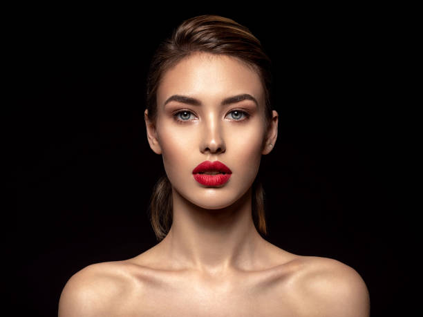 Beautiful  fashion woman with red lipstick. Pretty model. stock photo