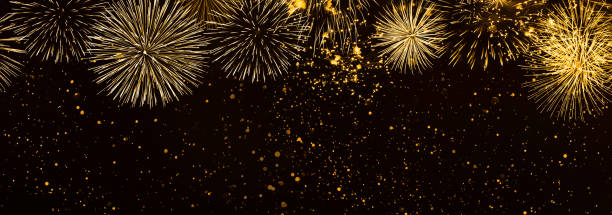 beautiful fireworks in the night background panorama - fogo de artifício dourado imagens e fotografias de stock