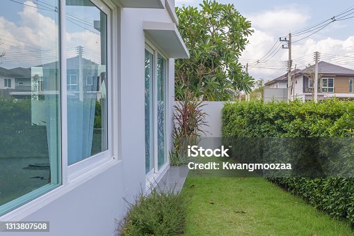 istock Beautiful Garden outside the house 1313807508