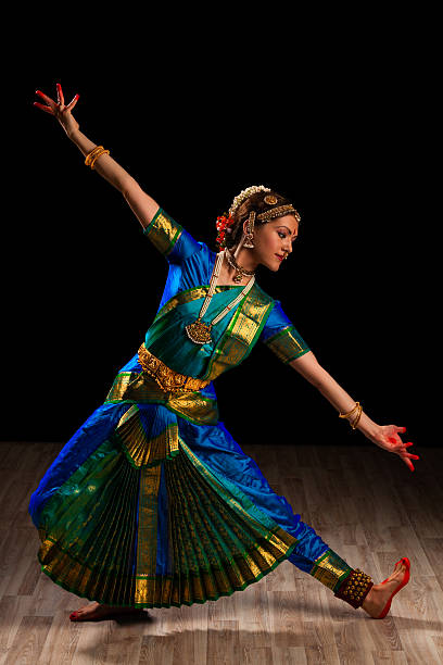 Beautiful girl dancer of Indian classical dance Bharatanatyam Young beautiful woman dancer exponent of Indian classical dance Bharatanatyam bharatnatyam dancer stock pictures, royalty-free photos & images