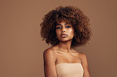 istock Beautiful girl with curly hairstyle 1314488650