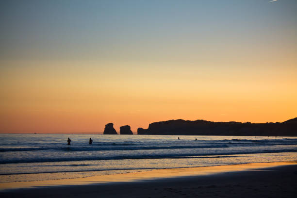 beautiful golden summer sunrise on hendaye beach stock photo
