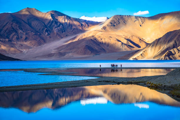 Beautiful lake Landscape with reflections of the mountains on the lake named Pangong Tso, situated around Leh, Ladakh, India. leh district stock pictures, royalty-free photos & images